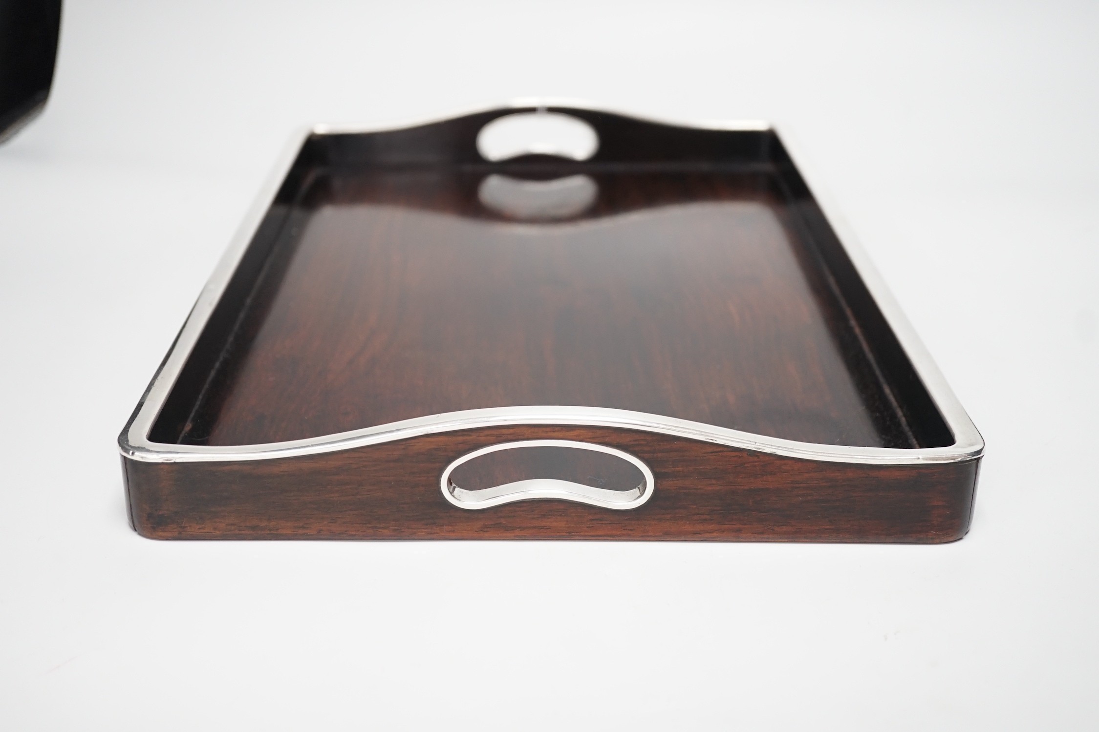 A 1920s Chinese hongmu and white metal mounted tray. 38cm wide